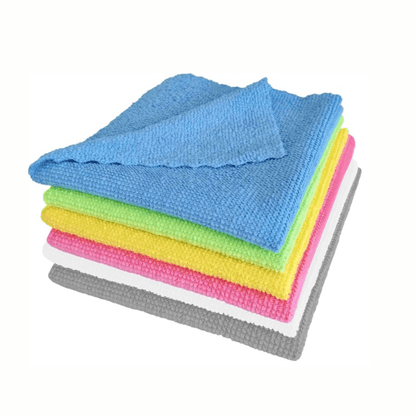 Uma pilha de panos de microfibra Arcora ECO-LINE 2in1 em azul, verde, amarelo, rosa, branco e cinza da Arcora International GmbH está organizada de forma ordenada para desinfecção de superfícies. O pano azul texturizado está no topo da pilha, garantindo limpeza e eficiência a cada passada.