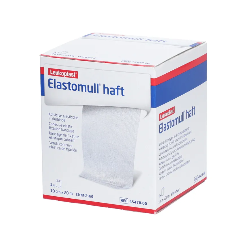 Uma caixa de BSN Elastomull® haft, uma bandagem de fixação elástica da BSN Medical GmbH. A caixa é predominantemente branca com acentos azuis e vermelhos e mostra na frente detalhes e especificações do produto.