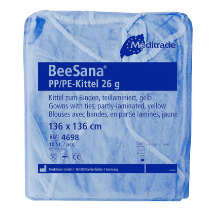 Um Meditrade BeeSana® PP/PE-Kittel 26g embalado em azul, embalagem de 10 unidades, rotulado com texto que indica detalhes do produto como material, cor, tamanho e quantidade da embalagem. Esta bata é concebida como proteção.