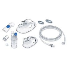 Apresentamos o inalador Beurer IH 26 da Beurer GmbH, que é perfeito para o tratamento de doenças respiratórias como a asma. O conjunto inclui máscaras faciais em vários tamanhos, um copo de medicamento, uma conexão em forma de T, um bocal, vários pequenos adaptadores e um longo tubo de ar transparente.