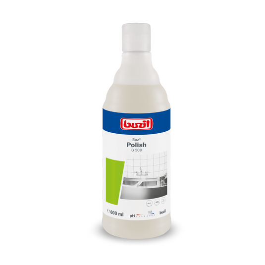 Uma garrafa de 600 ml de Buzil Buz® Polish G 508 Leite de Limpeza Pronto para Uso, em posição vertical. O rótulo apresenta um design azul e branco com acentos verdes e a imagem de uma superfície azulejada, destacando a eficácia na limpeza de superfícies. O logotipo da marca BUZIL-WERK Wagner GmbH & Co. KG está colocado de forma proeminente na parte superior.