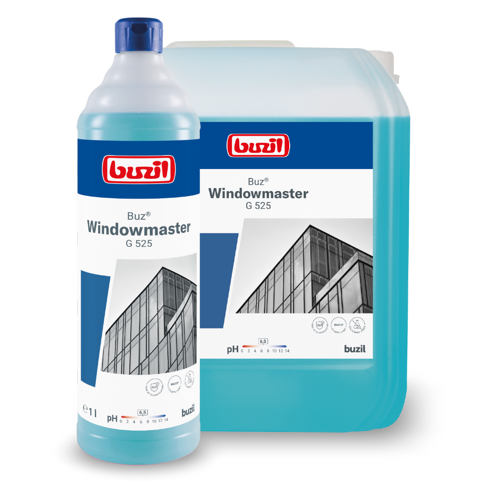 Uma garrafa e um grande recipiente de Buzil Buz® Windowmaster G 525 Concentrado de Limpeza de Vidros e Janelas da BUZIL-WERK Wagner GmbH & Co. KG destacam-se pela fórmula de secagem rápida. As etiquetas mostram uma fachada de edifício com janelas e indicam um valor de pH de 9,5. Ambos estão preenchidos com um líquido azul que promete um efeito anti-sujidade melhorado.