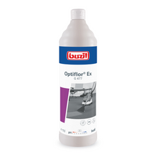 Uma garrafa de 1 litro de Buzil Optiflor® Ex G 477 Limpador de Carpete da BUZIL-WERK Wagner GmbH & Co. KG, especialmente desenvolvida para extração por pulverização. O rótulo exibe o logotipo azul-vermelho marcante ao lado de uma imagem de chão em preto e branco com informações detalhadas do produto. Este limpador neutro em pH é perfeito para aplicações de limpeza versáteis.