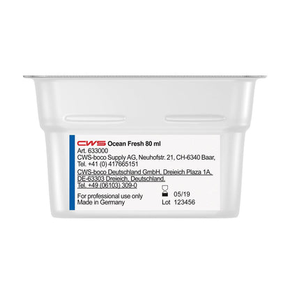 Um recipiente branco de 80 ml com a inscrição "CWS ParadiseLine Fragrância para Casa de Banho para Dispensador de Fragrâncias Paradise Air Bar" da CWS, fabricado na Alemanha para uso profissional, com instruções e informações de contato; data de validade 05/19, número do lote 123456.