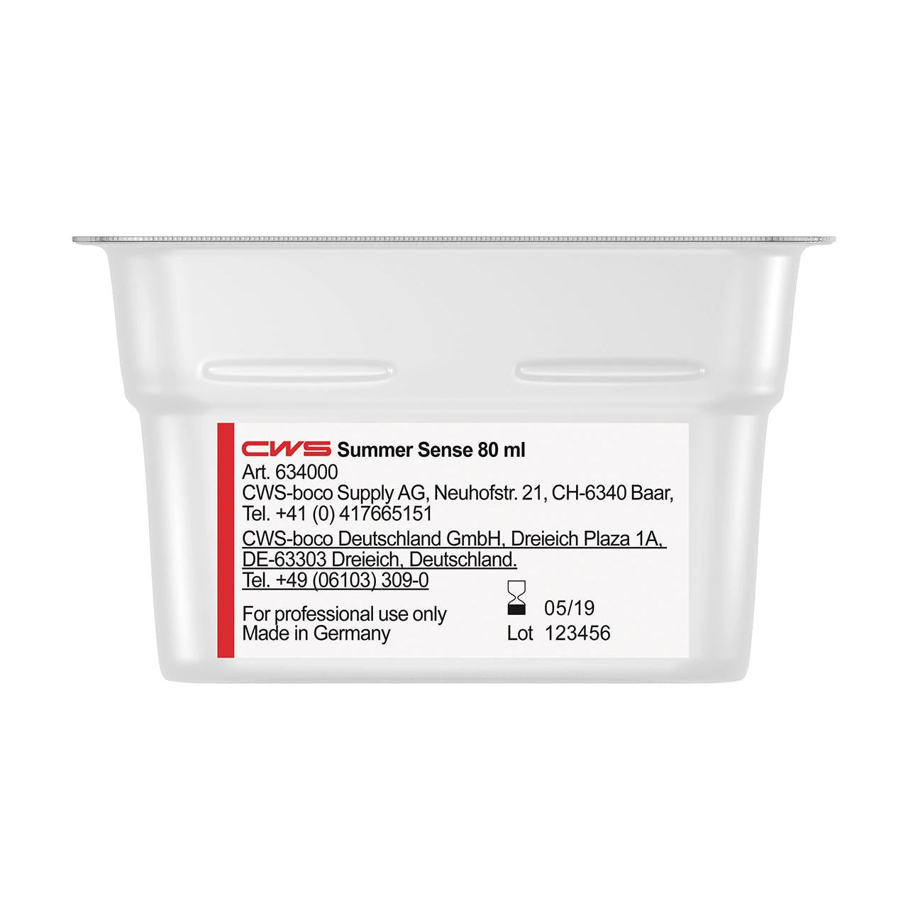 Um recipiente branco de 80 ml com a inscrição "CWS ParadiseLine Fragrância para Casa de Banho para Dispensador de Fragrâncias Paradise Air Bar" da CWS. Contém informações do produto, contatos do fabricante na Suíça e na Alemanha, data de validade 05/19, lote 123456. Apenas para uso profissional.