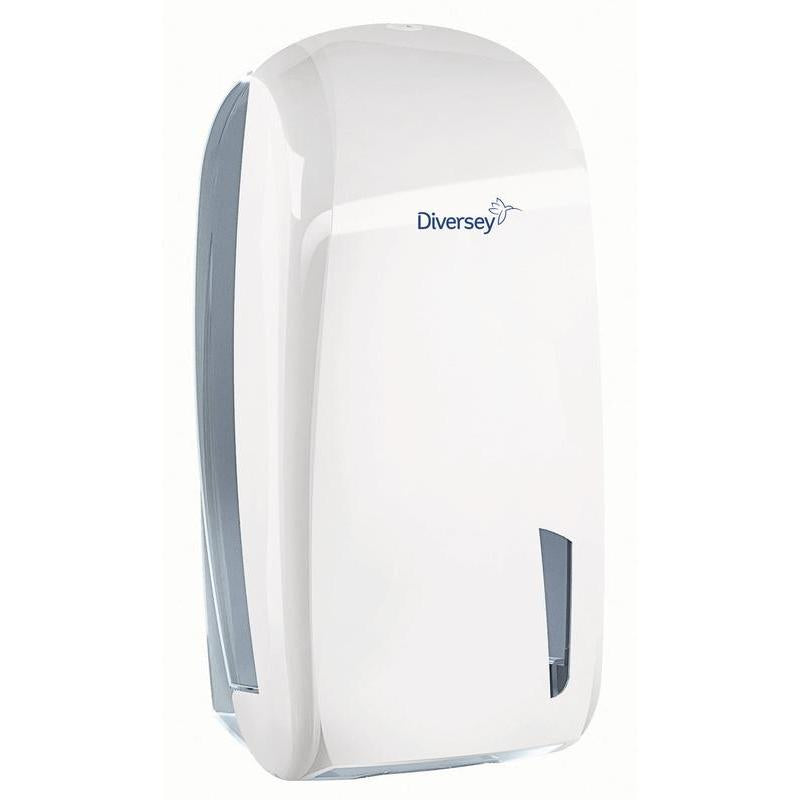 O suporte para papel higiénico de folha única Diversey em plástico branco/transparente (328 x 165 x 135 mm) para folhas únicas possui uma janela de visualização e garante higiene para papel higiénico em áreas sanitárias públicas. Adequado para papel 7523655.