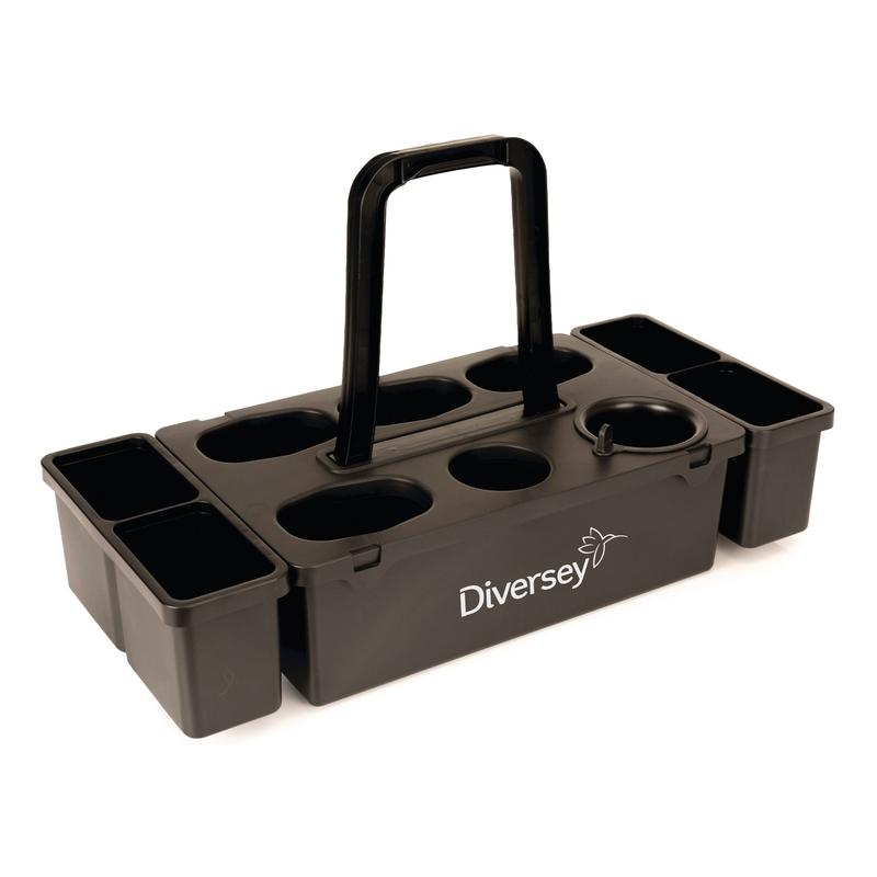 O cesto de transporte Room Care da Diversey Deutschland GmbH & Co. OHG é um caddy de plástico preto com alça central e compartimentos, ideal para armazenar garrafas de produtos durante a limpeza de quartos. "Diversey" está impresso na lateral.