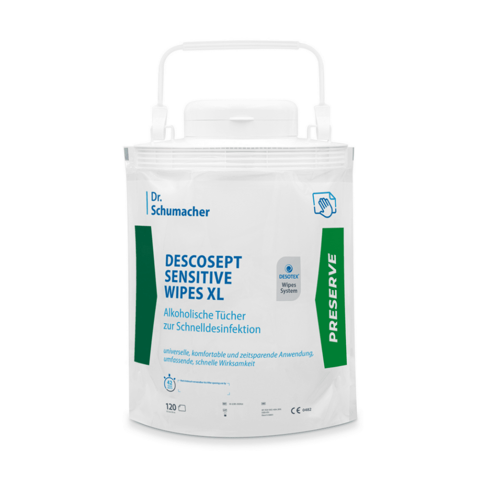 Um pacote branco, resselável, de Dr. Schumacher Descosept Sensitive Wipes XL - dispensador de toalhetes descartáveis da Dr. Schumacher GmbH com branding verde-azulado. O pacote contém 120 toalhetes desinfetantes para desinfeção rápida em áreas próximas ao paciente e possui uma alça na parte superior para fácil transporte.