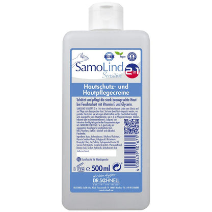 Uma garrafa de 500 ml Dr. Schnell SamoLind Sensitive 2em1 creme de proteção e cuidado da pele da DR.SCHNELL GmbH & Co. KGaA com texto em alemão, rótulo azul e branco, símbolos para pele vegana e sensível e enriquecido com glicerina para cuidado adicional.