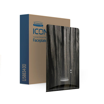 Uma placa frontal de dispensador Kimberly-Clark Professional™ Icon™ embalada - eSkinCare está ao lado de uma tampa eSkinCare preta com padrão de madeira, destacando os acessórios de lavabos elegantes da Kimberly-Clark GmbH para instalações modernas.