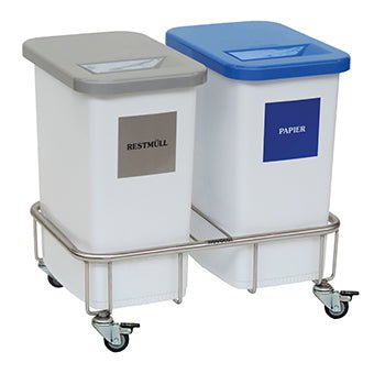 Dois recipientes brancos com as inscrições "Resíduos" e "Papel" no coletor de materiais recicláveis Novocal com chassis de coleta dupla Materia da Novocal estão lado a lado para uma separação eficiente de lixo.