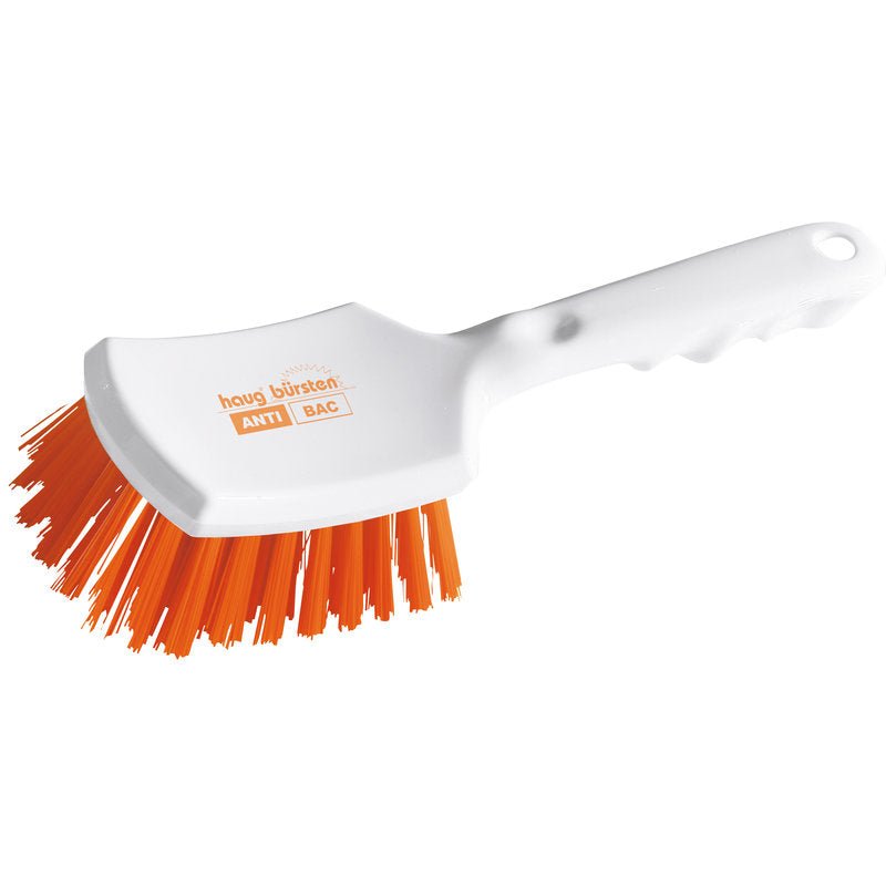 Haug Bürsten KG ANTI BAC escova de cabo feita de plástico branco com cabo ligeiramente curvado e cerdas rígidas de PBT laranja (ø 0,50 mm), inclinadas para esfregar. No cabeçote da escova estão impressos "ANTI BAC" e "Haug Bürsten". Tamanho: 260x72x35mm.