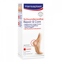 Eine Schachtel mit Auslaufartikel: Hansaplast Schrundensalbe Repair & Care (40 ml) von Beiersdorf AG, mit einem Bild von nackten Füßen mit einem roten Kreis auf rissigen Fersen und einem deutschen Text, der die Vorteile für trockene Haut und rissige Fersen beschreibt.