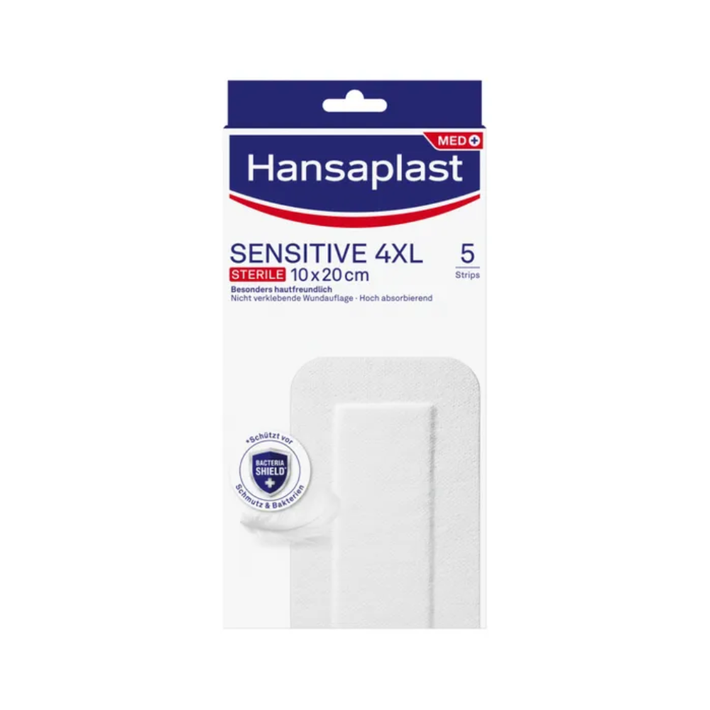 A imagem mostra uma embalagem de Hansaplast Sensitive XL, estéril, especialmente amigável à pele da Beiersdorf AG, que contém coberturas para feridas 4XL estéreis nas dimensões de 10x20 cm. A embalagem indica que contém 5 tiras. A embalagem é predominantemente branca com acentos azuis e vermelhos e contém um texto que destaca as características.