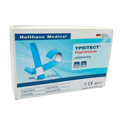 Uma caixa de curativos para dedos detectáveis Holthaus Ypsitect® da Holthaus Medical GmbH & Co. KG. A caixa, predominantemente azul e branca, contém 100 curativos elásticos para dedos com as medidas de 2 x 18 cm. A embalagem é ideal para o cuidado de feridas e orgulhosamente indica que o produto é fabricado na Alemanha.