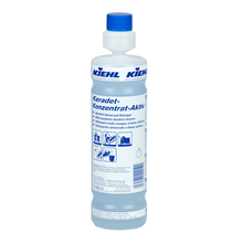 Uma garrafa de 1 litro do produto «Kiehl Keradet-Konzentrat-Aktiv Alkohol-Universal-Reiniger» da Johannes Kiehl KG, para uma limpeza sem deixar marcas, com tampa azul e etiqueta multilingue com informações sobre o produto e instruções de utilização.