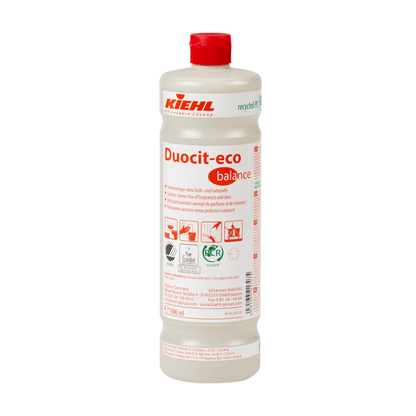 Uma garrafa de plástico de 1 litro da Johannes Kiehl KG Kiehl Duocit-eco balance Sanitärreiniger ohne Duft- und Farbstoffe com tampa vermelha e rótulo branco com informações do produto em vermelho e preto, símbolos e instruções de uso.