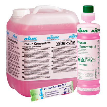 Três limpadores concentrados Kiehl Procur com cuidado especial da Johannes Kiehl KG - um grande recipiente, uma pequena garrafa e um tubo - contêm líquido rosa com rótulos em alemão, ideal como limpador eficaz para superfícies sensíveis.