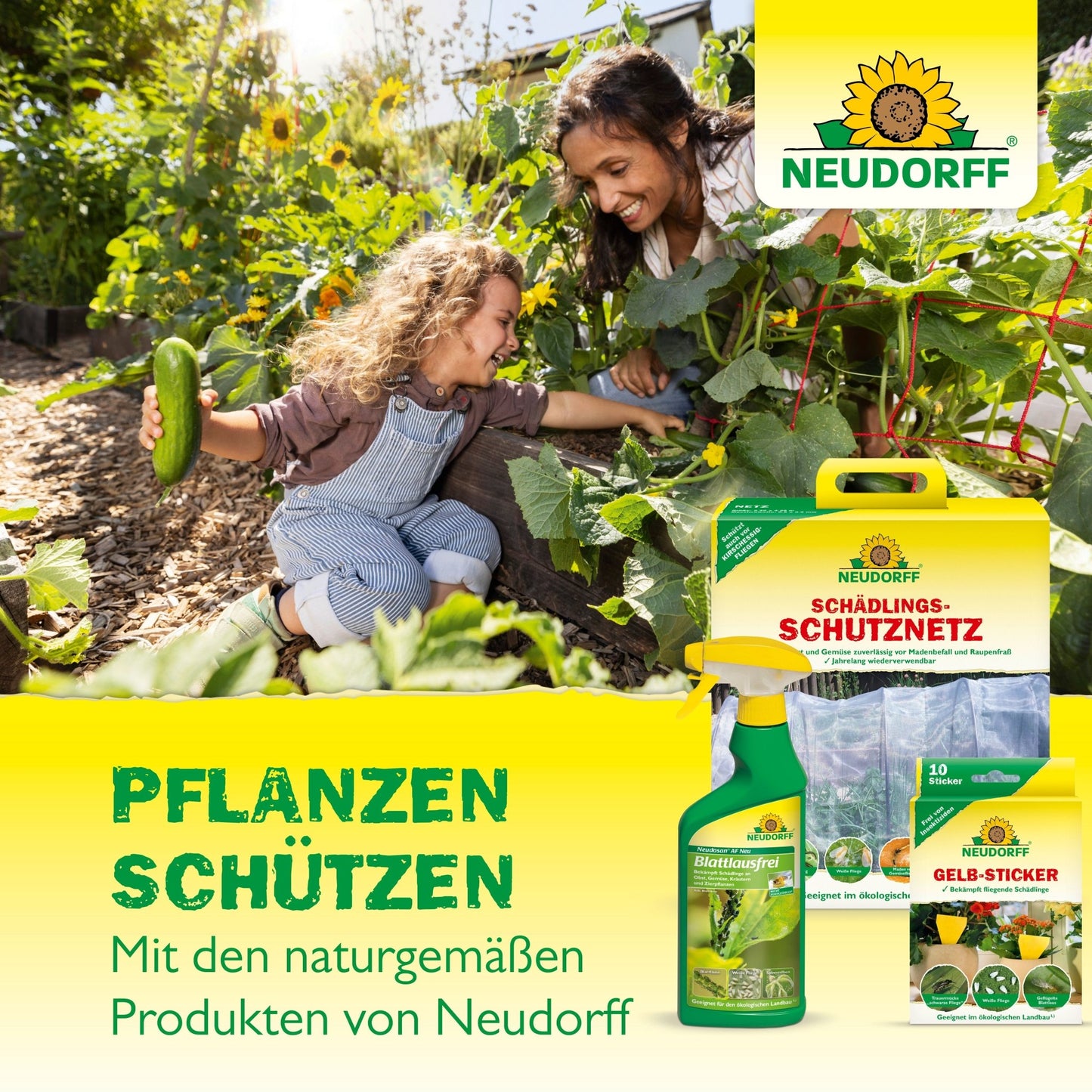 Uma mulher e uma criança colhem vegetais em um jardim. Em primeiro plano estão os Nützlinge contra Dickmaulrüssler da Neudorff Shop, que promovem uma proteção natural para plantas em jardins saudáveis.