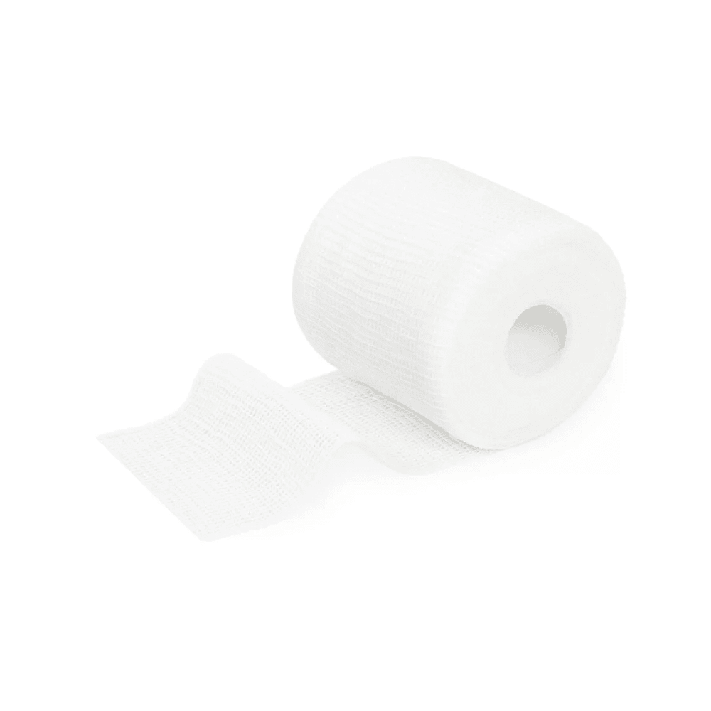 Um único rolo de ligadura de fixação branca Meditrade ABE® Last® com algumas folhas desenroladas, isolado em um fundo branco.