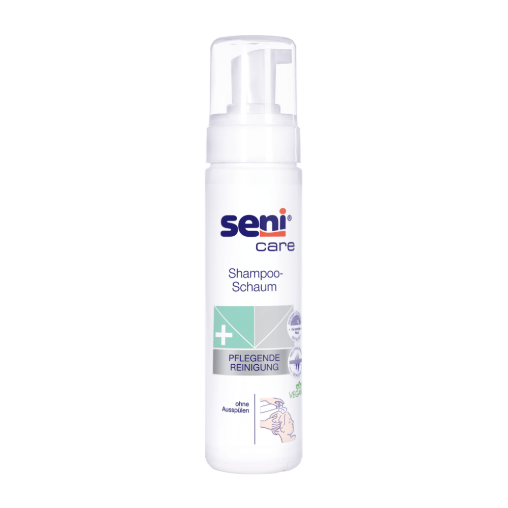 O Seni Care Shampoo-Espuma 200 ml da TZMO Deutschland GmbH está disponível em um frasco alto branco com dispensador de bomba e texto em azul e verde. É ideal para „limpeza suave“ e „lavagem de cabelo sem água“ e contém símbolos Vegan e de cuidado para fácil reconhecimento.