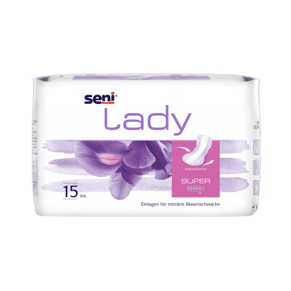 As almofadas para incontinência Seni Lady Super da TZMO Deutschland GmbH são um pacote branco com acentos violetas e motivos florais e contêm 15 almofadas para fraqueza moderada da bexiga. O texto alemão contém informações sobre conforto ao usar, características e capacidade de absorção.