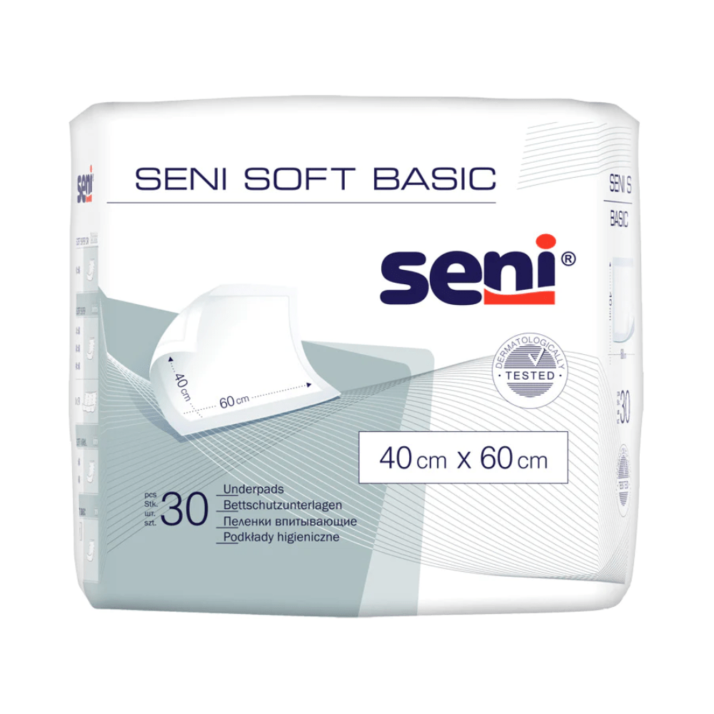 Uma embalagem de 30 unidades da proteção de cama Seni Soft Basic (vários tamanhos) da TZMO Deutschland GmbH, em saco branco com acentos azul-cinza, oferece proteção confiável. O logotipo da Seni e as informações do produto são claramente visíveis.