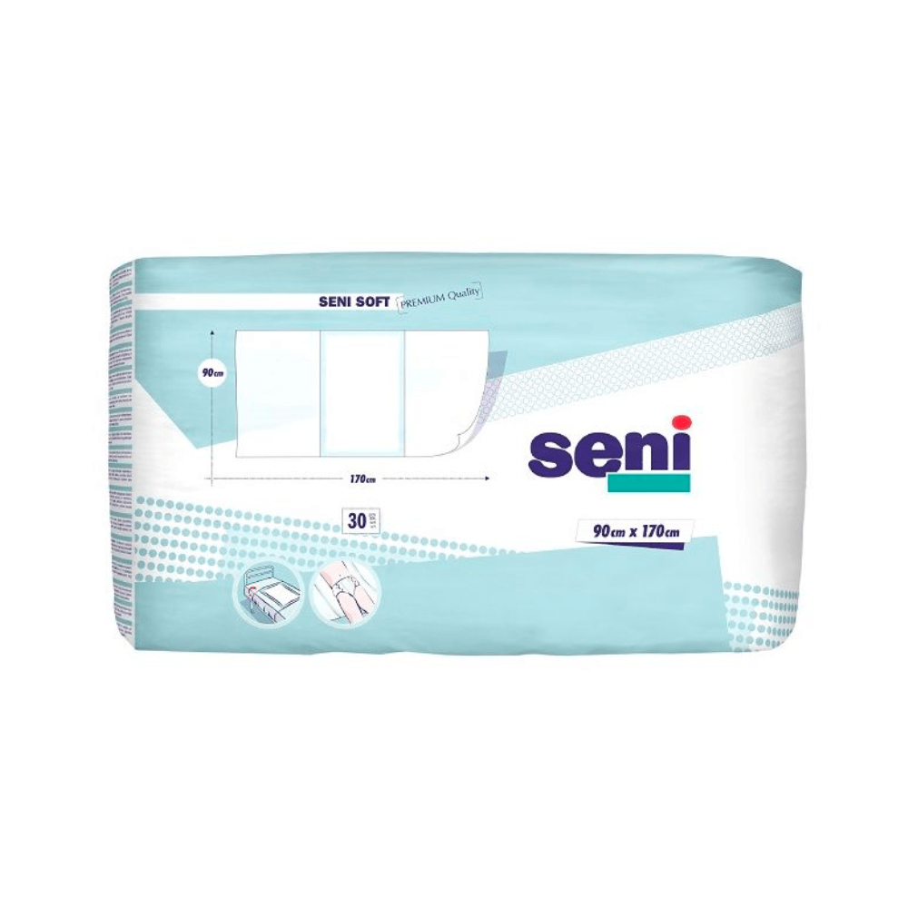 Uma embalagem retangular de protetores de cama Seni Soft Super da TZMO Deutschland GmbH, disponível em vários tamanhos. A embalagem azul-branca mostra informações do produto e exemplos de aplicação. A embalagem contém 30 unidades no formato 90 x 170 cm.