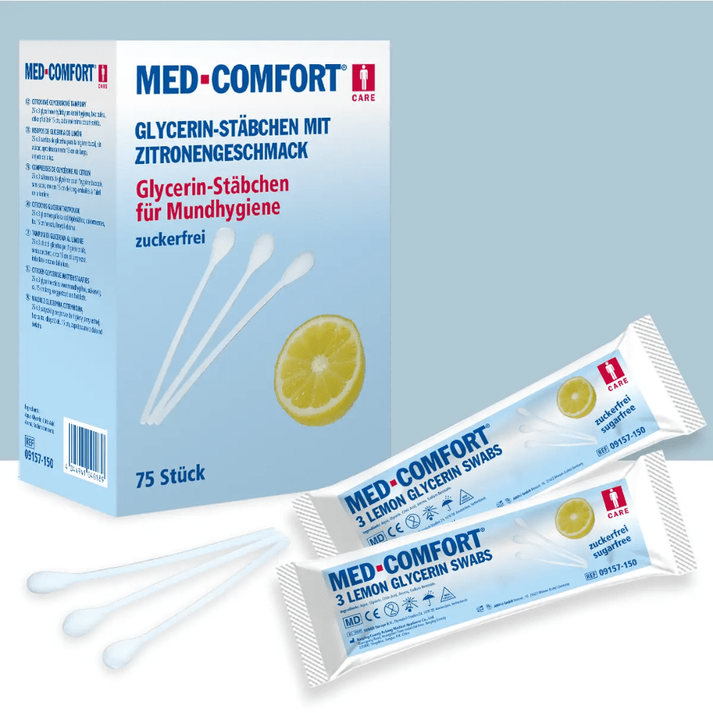 A imagem mostra uma caixa de Top-Comfort PP Sticks de Limão com sabor a lima para o cuidado oral da AMPri Handelsgesellschaft mbH. A caixa contém 75 unidades e mostra o texto em alemão. Na frente da caixa, também estão ilustrados dois cotonetes embalados individualmente e dois sticks de sabor a lima sem embalagem.