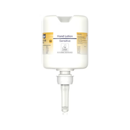 Um dispensador de loção para mãos Tork 420202 em branco com bico transparente e a inscrição "Desinfecção de Mãos Sensível e Hidratante" em letras pequenas oferece um design minimalista, focado na distribuição de loção hidratante, perfeito para o cuidado de pele sensível.