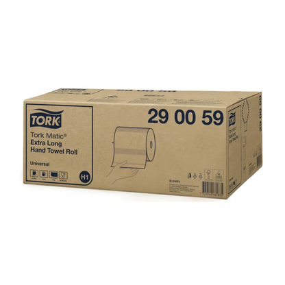 Em uma caixa com a inscrição "Tork Matic® 290059 toalha de papel extra longa Universal H1 1-camada" está ilustrada uma mão segurando um rolo de toalha de papel extra longo. A caixa fabricada pela TORK – Essity Professional Hygiene Germany GmbH contém vários símbolos de envio e manuseio e contém seis rolos.