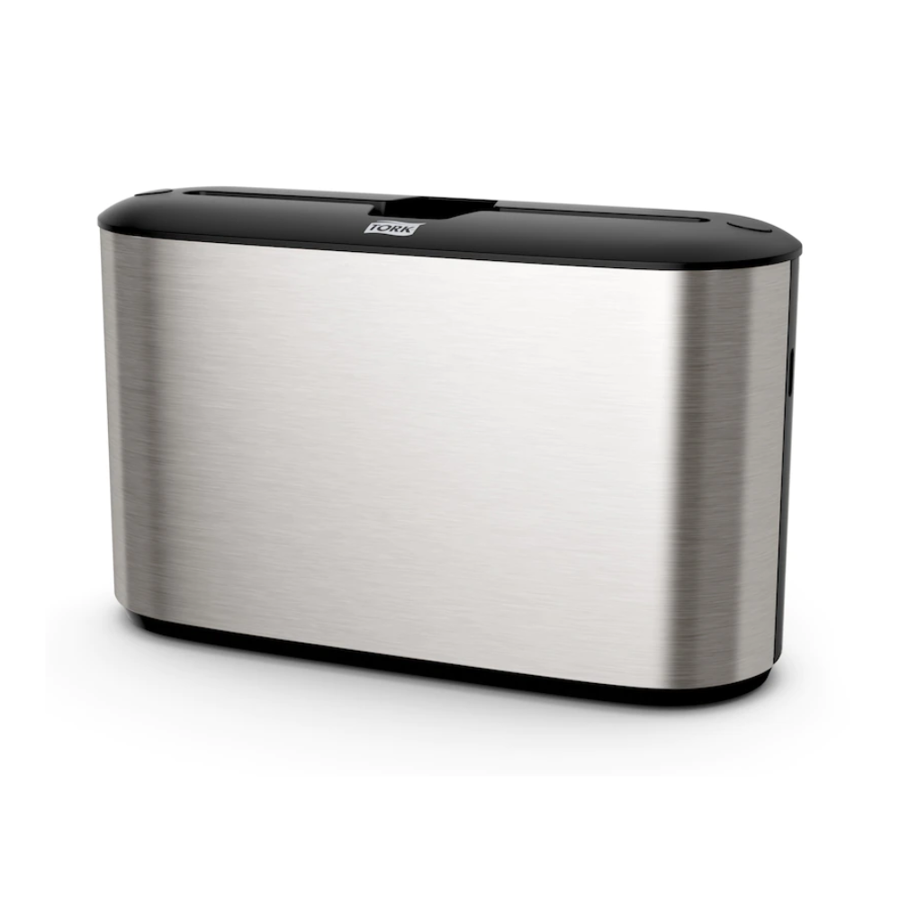 Experimente o design elegante do dispensador de mesa Tork Xpress® 460005 para toalhas de mão Multifold, parte da coleção Image Line H2. Este dispensador da TORK – Essity Professional Hygiene Germany GmbH tem uma forma retangular esbelta com uma parte superior preta e uma superfície lisa e refletora. O seu estilo minimalista complementa perfeitamente um espaço ultramoderno e combina perfeitamente com outros acessórios Tork Xpress.
