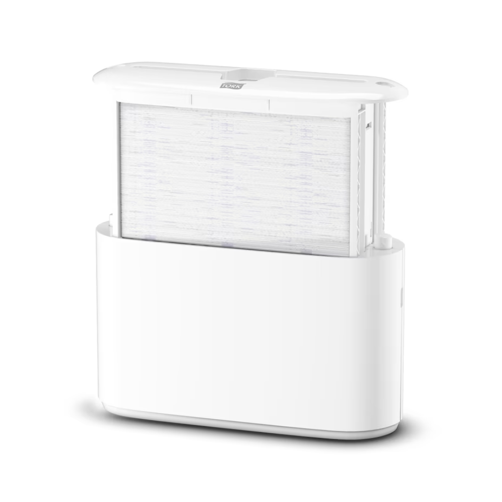 O dispensador de mesa Tork Xpress® 552200 para toalhas de mão multifolhas Elevation H2 da TORK - Essity Professional Hygiene Germany GmbH destaca-se por um design esbelto e minimalista com um filtro visível integrado na base. O filtro posicionado verticalmente melhora a estética geral e a parte superior está ligeiramente aberta para demonstrar a sua funcionalidade eficiente.