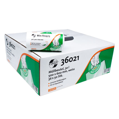 Uma caixa de sacos de lixo DEISS First Plus® é exibida com um rolo de sacos no topo. A embalagem indica que cada saco tem capacidade para 30 litros e mede 500 x 600 mm. A cor dos sacos é branca. A caixa destaca a marca DEISS First Plus com um design Easy Opener e possui o número de produto 36021 com a marca verde da EMIL DEISS KG (GmbH + Co.).