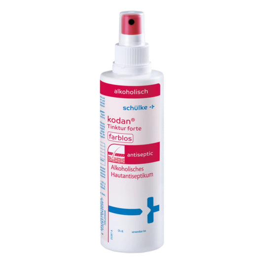 Uma garrafa de schülke kodan® Tinktur forte antisséptico para a pele, spray antisséptico incolor da Schülke & Mayr GmbH com bico pulverizador vermelho. O rótulo é em branco, rosa e azul e apresenta um texto alemão sobre